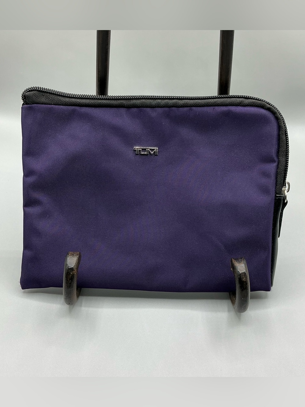 Tumi Purple Toiletry Pouch with Black Trim and Silver logo